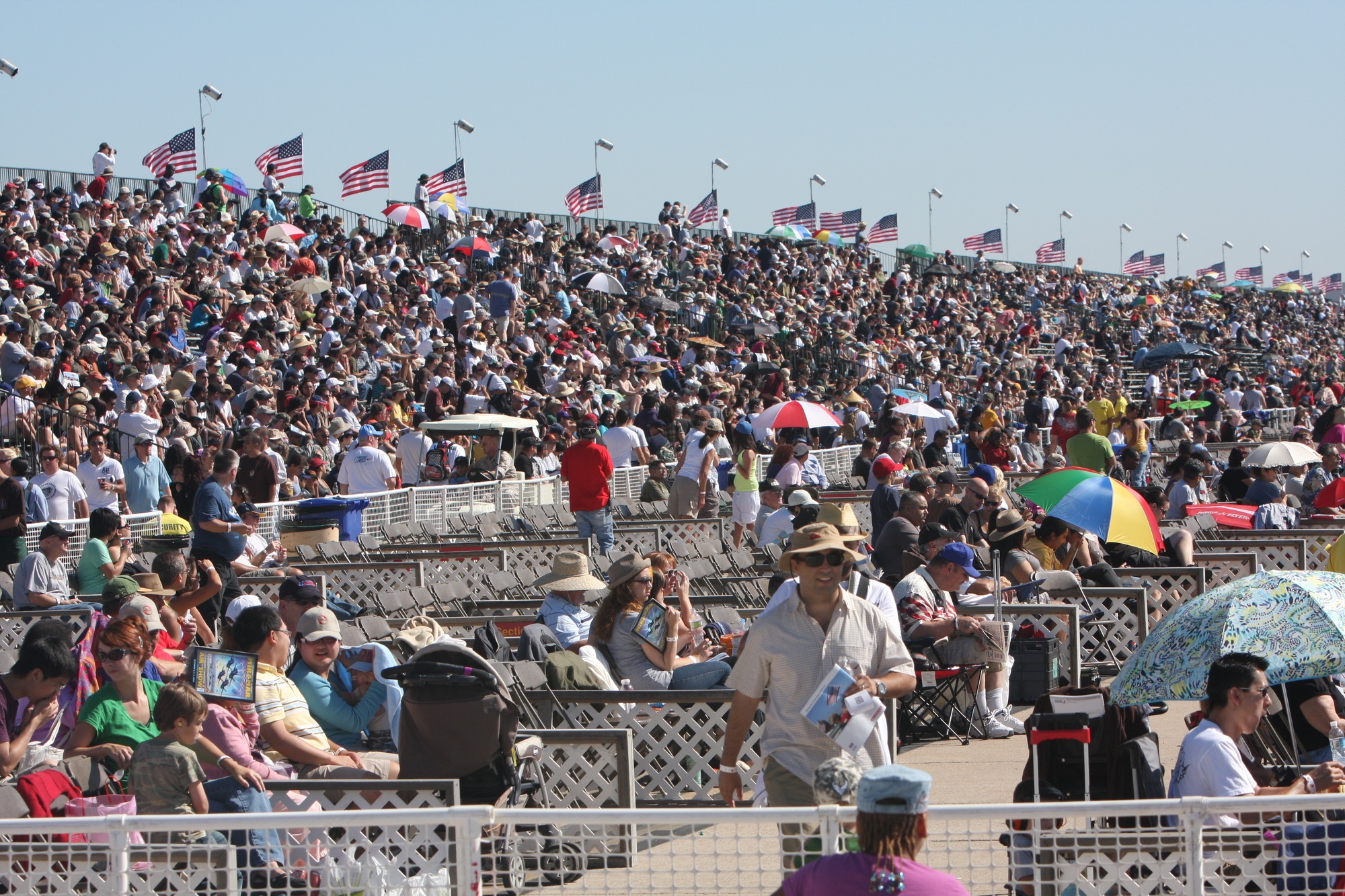 Spectators watching an air show from grandstand seating at MCAS Miramar