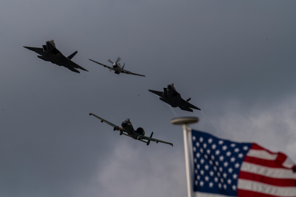 Heritage flight formation with warbird and modern jets