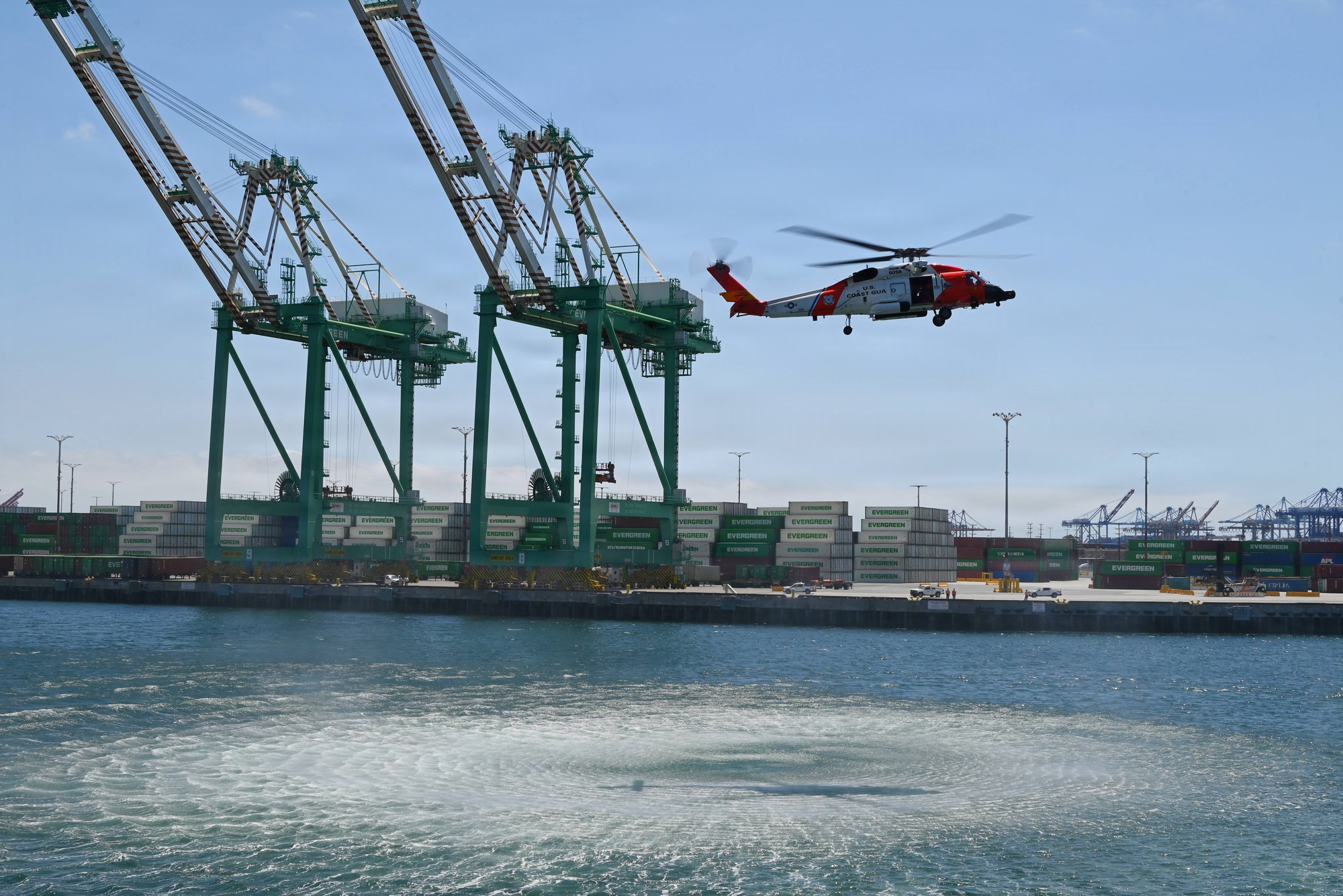 Coast Guard MH-60 Jayhawk helicopter performing a search and rescue demonstration at Los Angeles Fleet Week 2026