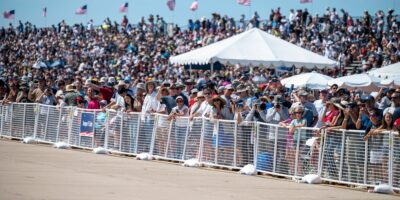 Large crowd watching an aviation demonstration at the MCAS Miramar Air Show