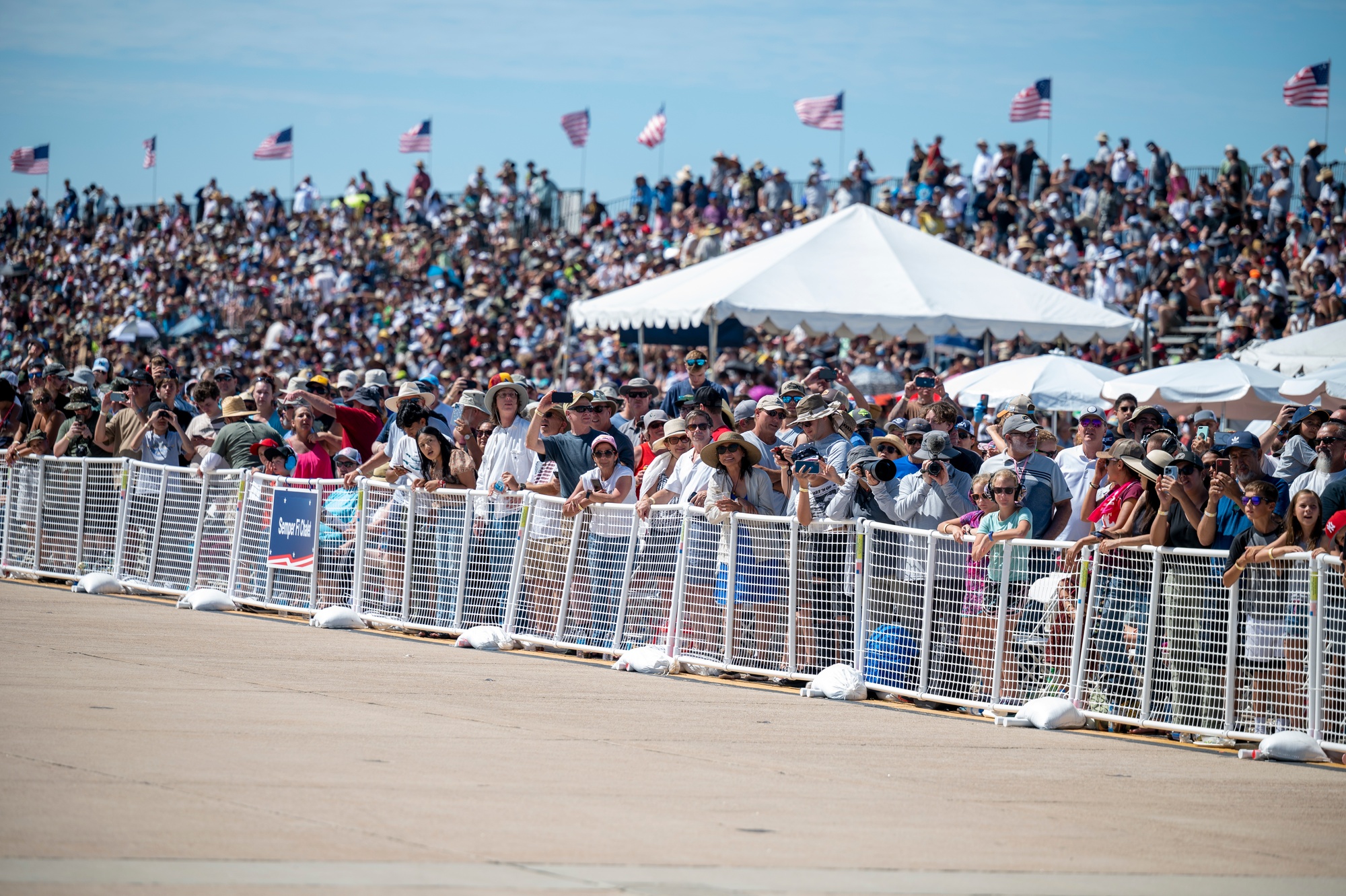 Large crowd watching an aviation demonstration at the MCAS Miramar Air Show