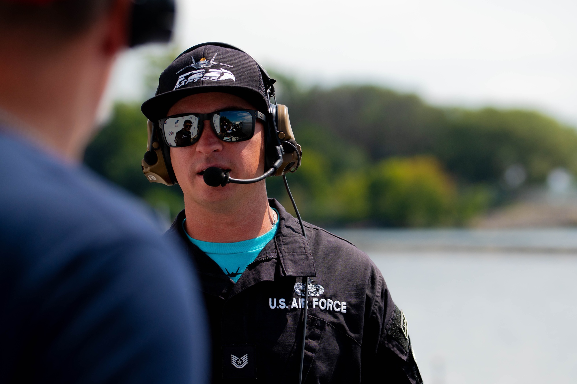 F-22 maintenance team chief speaking with an air boss at the Toronto International Air Show in 2024